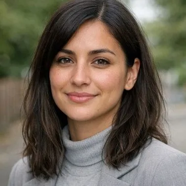 Young woman, olive skin, dark hair, hazel eyes, gray turtleneck, calm expression